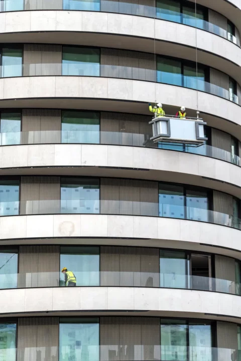 Construction workers on a skyscraper