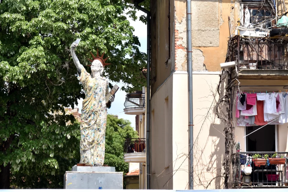 Lady Liberty indulges in consumerism in a random backyard in Sofia